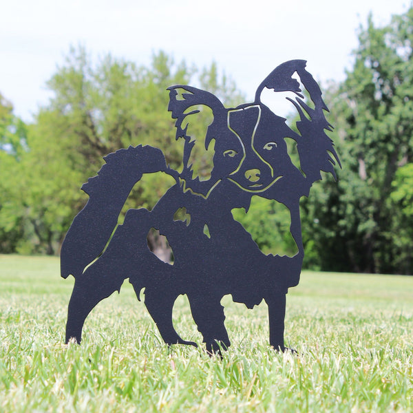 Papillon Corten steel dog silhouette, matte black finish, shown outdoors – My Metal Rescue
