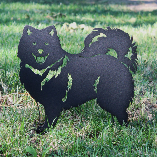 Keeshond Corten steel dog silhouette, matte black finish, shown outdoors – My Metal Rescue