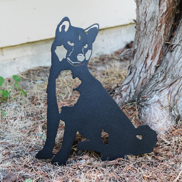Shiba Inu Corten steel dog silhouette, matte black finish, shown outdoors – My Metal Rescue