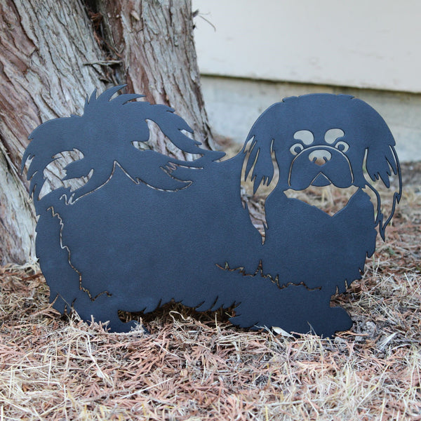 Pekingese Corten steel dog silhouette, matte black finish, shown outdoors – My Metal Rescue