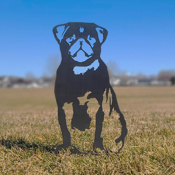 Pug Corten steel dog silhouette, raw polished steel finish, shown outdoors – My Metal Rescue