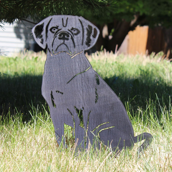 Puggle Corten steel dog silhouette, raw polished steel finish, shown outdoors – My Metal Rescue