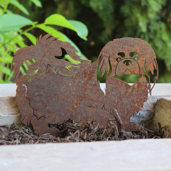 Pekingese Corten steel dog silhouette, rusted patina finish, shown outdoors – My Metal Rescue
