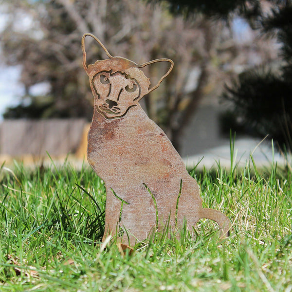 Siamese Corten steel dog silhouette, rusted patina finish, shown outdoors – My Metal Rescue